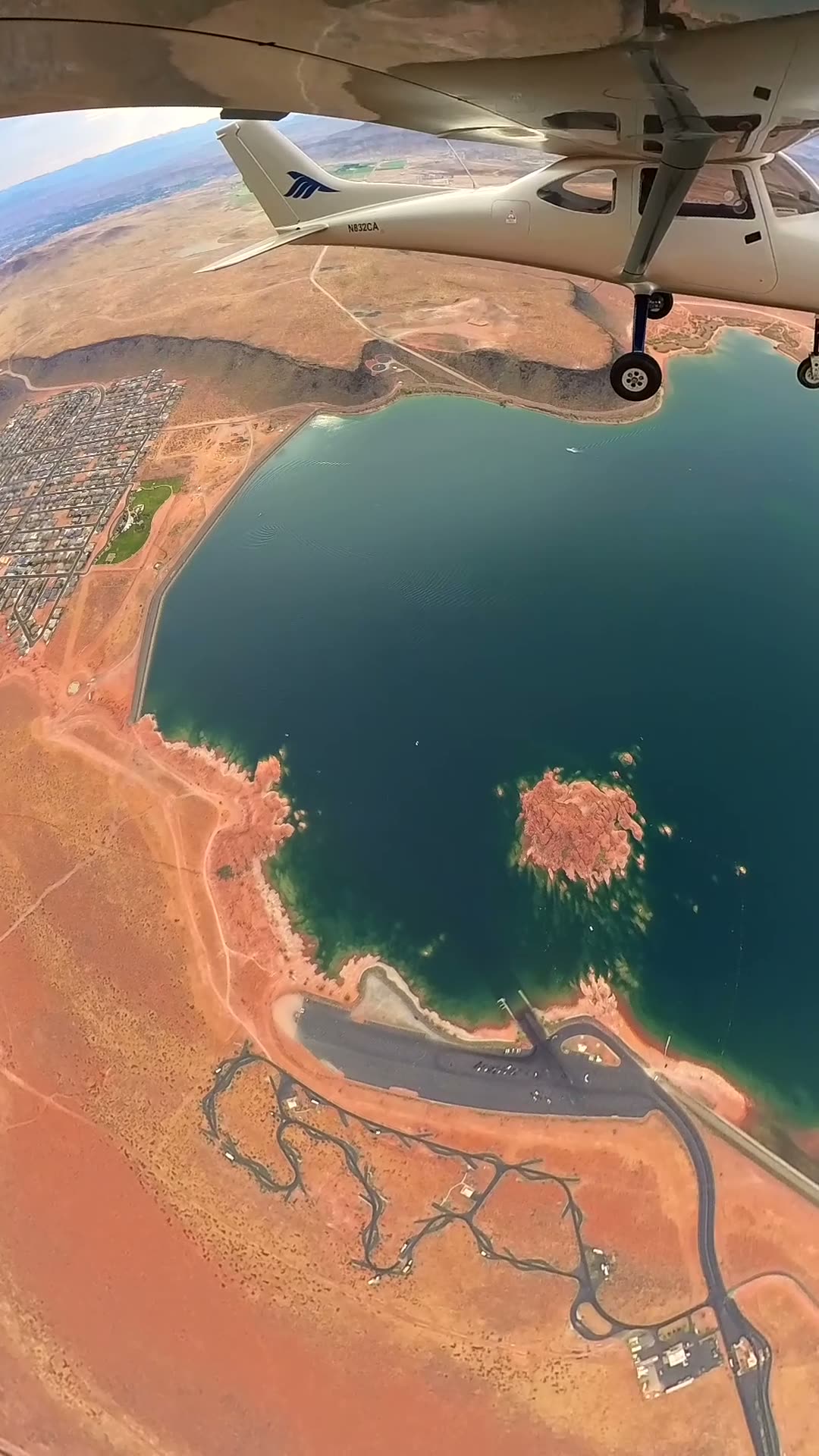 View from under the wing of a training airplane over Sand Hollow Reservoir near Hurricane, Utah