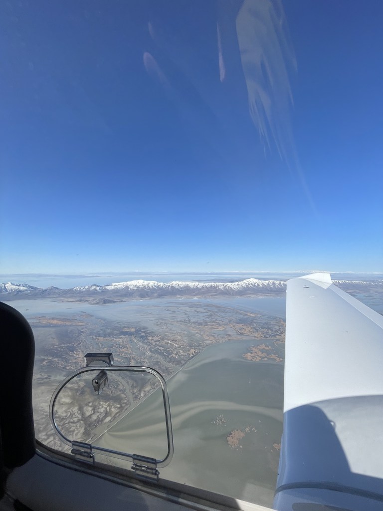 Flying over the Great Salt Lake, some snow left over on the mountain peaks